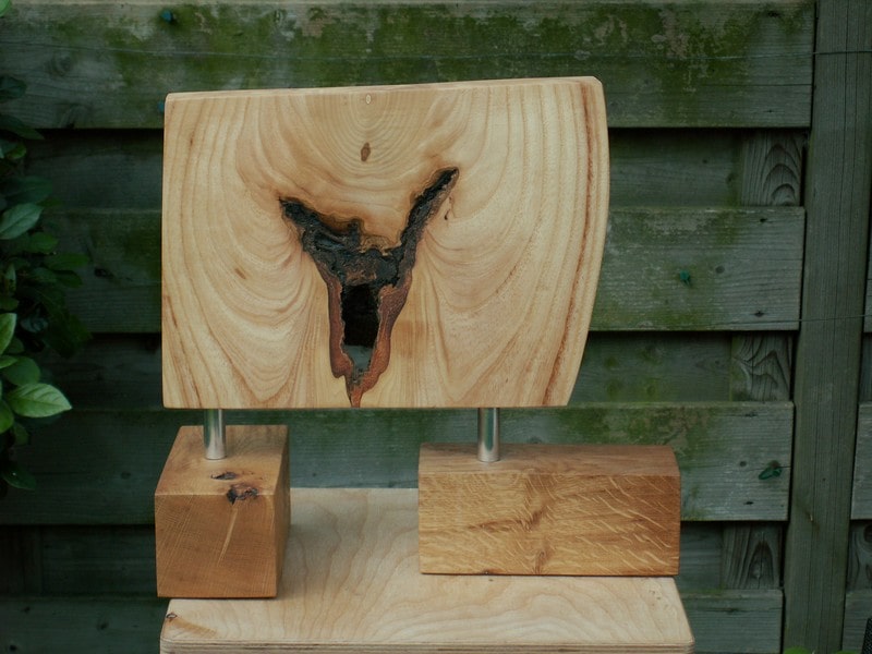 Vruchtbaarheid uitgebeeld in een houten blok